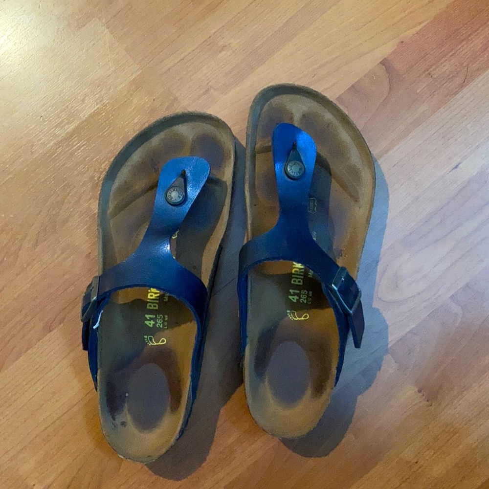 41 Birkenstock’s lightly worn blue one toe strap